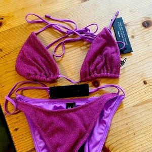 Triangl swimsuit. New with tags. Size XL runs very small.